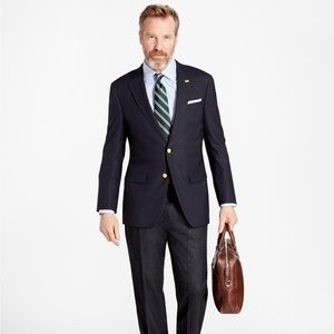 A navy blue Brooks Brother Madison 1818 sports coat sized 41L.